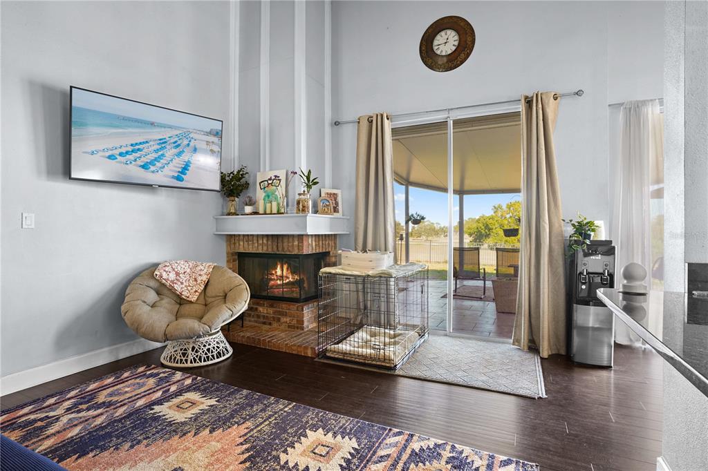 2619 Rangeley Court Orlando, FL 32835 - Photo 14 of 59 a living room with furniture and a wooden floor
