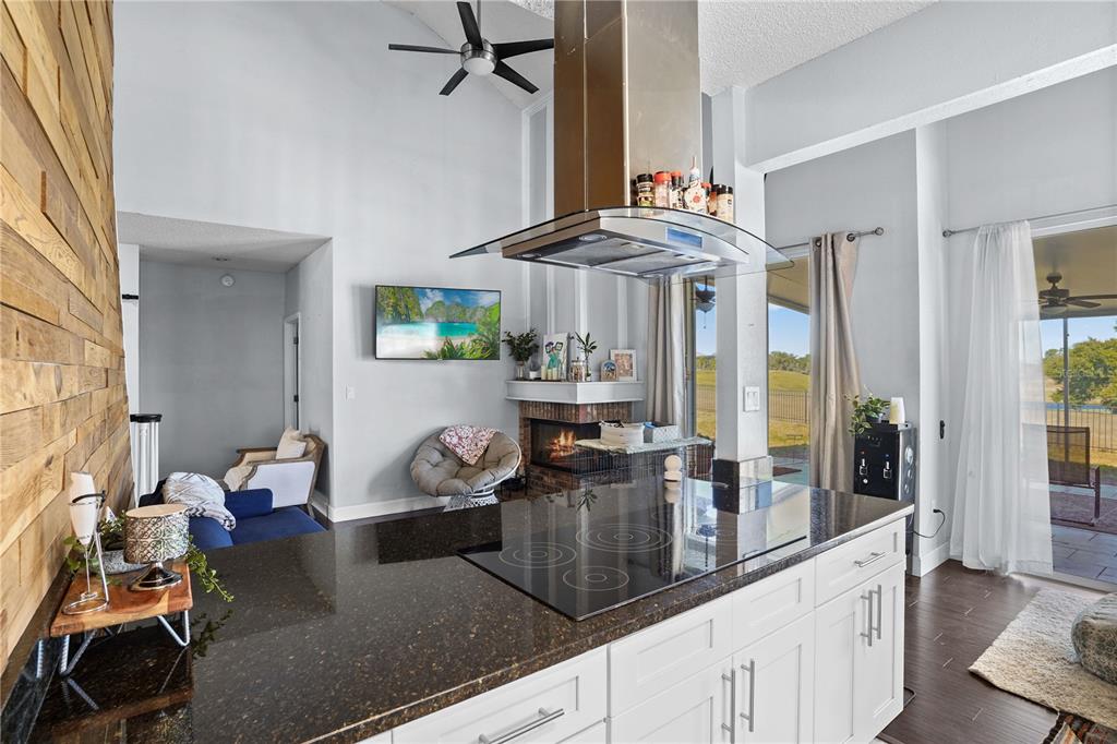 2619 Rangeley Court Orlando, FL 32835 - Photo 19 of 59 a kitchen with a table and chairs