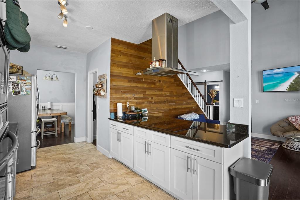 2619 Rangeley Court Orlando, FL 32835 - Photo 22 of 59 a kitchen with stainless steel appliances a stove and a refrigerator