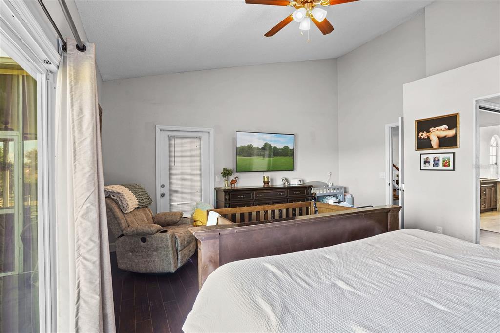 2619 Rangeley Court Orlando, FL 32835 - Photo 26 of 59 a bedroom with bed and window