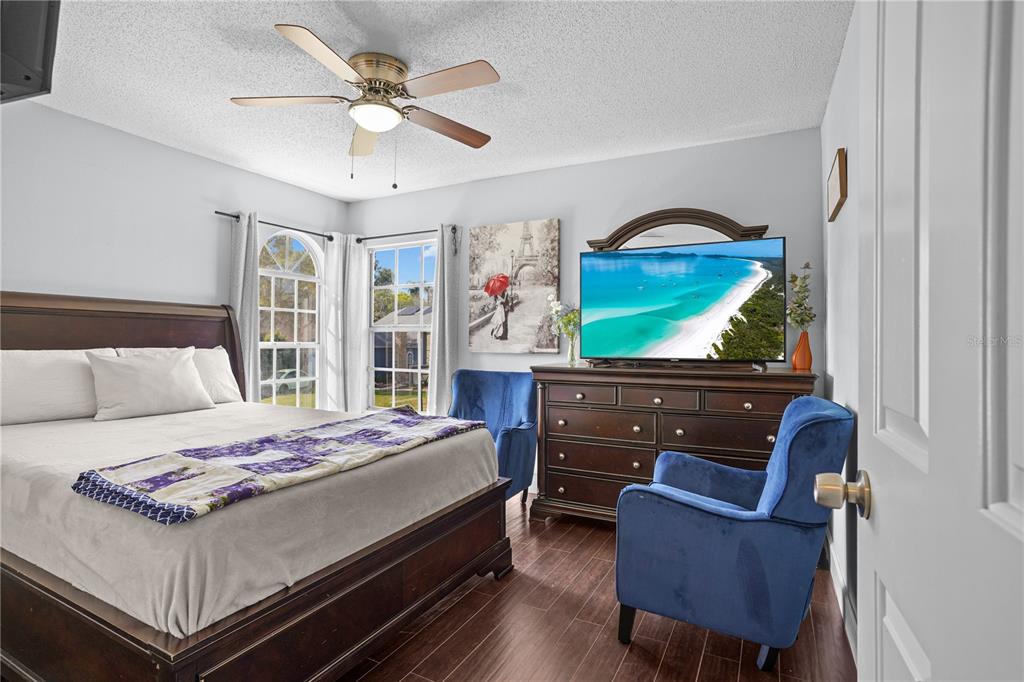 2619 Rangeley Court Orlando, FL 32835 - Photo 43 of 59 a bedroom with a bed window and couch