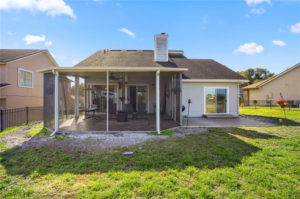 2619 Rangeley Court Orlando, FL 32835 - Photo 48 of 59 a front view of a house with a yard