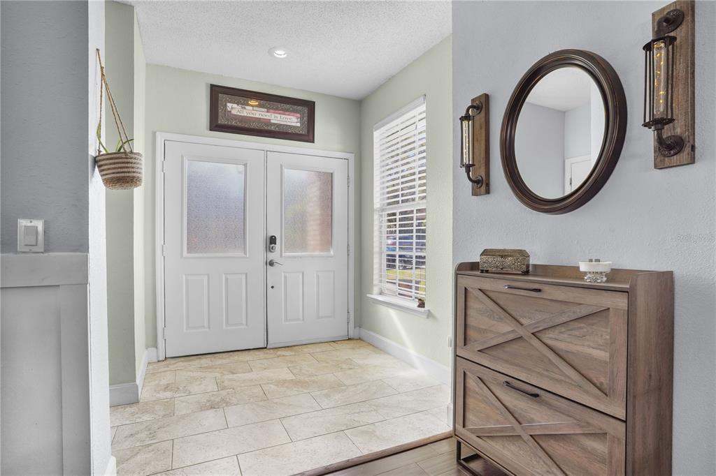 2619 Rangeley Court Orlando, FL 32835 - Photo 8 of 59 a view of a livingroom with furniture and a window