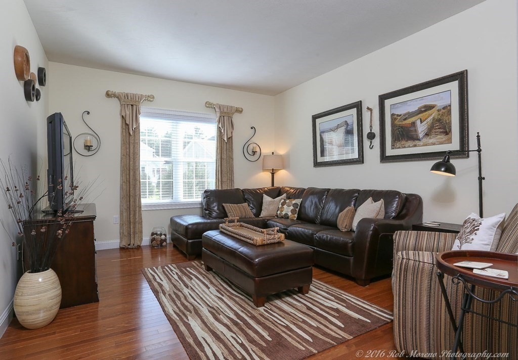 3 Dunrobin Circle, Unit 3 Methuen, MA 01844 - Photo 17 of 28 a living room with furniture and wooden floor