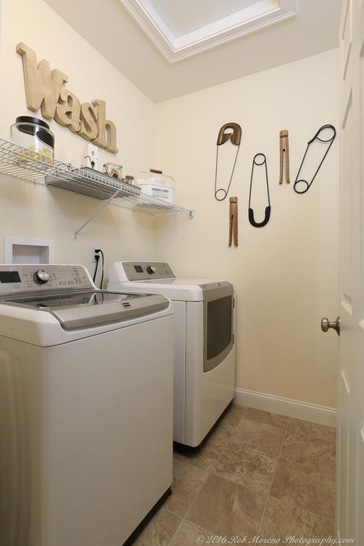 3 Dunrobin Circle, Unit 3 Methuen, MA 01844 - Photo 20 of 28 a utility room with multiple dryer and cabinets