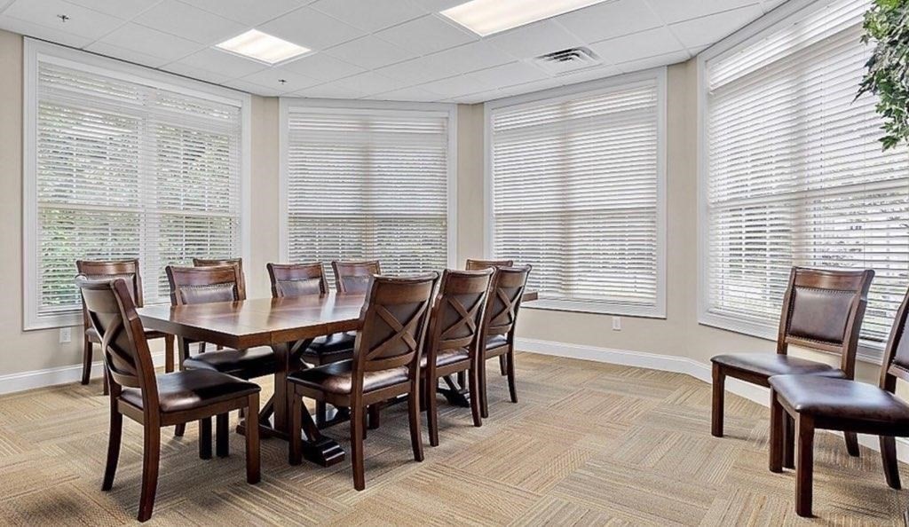 3 Dunrobin Circle, Unit 3 Methuen, MA 01844 - Photo 25 of 28 a view of a dining room with furniture and window