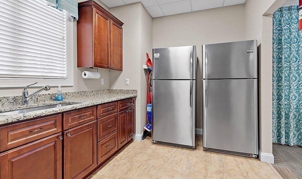 3 Dunrobin Circle, Unit 3 Methuen, MA 01844 - Photo 28 of 28 a kitchen with stainless steel appliances granite countertop a refrigerator and a sink