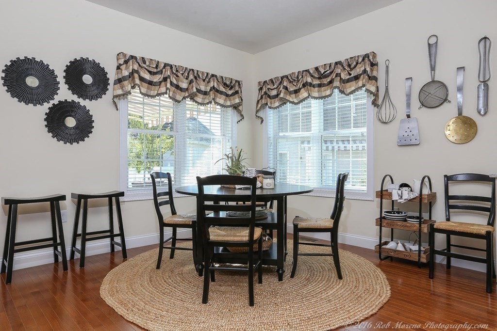 3 Dunrobin Circle, Unit 3 Methuen, MA 01844 - Photo 10 of 28 a dining room with furniture and wooden floor
