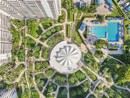 an aerial view of a house with a garden