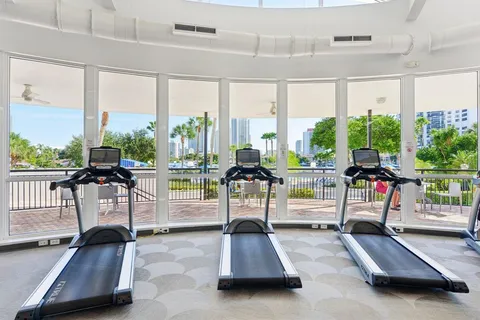 a living room with large windows