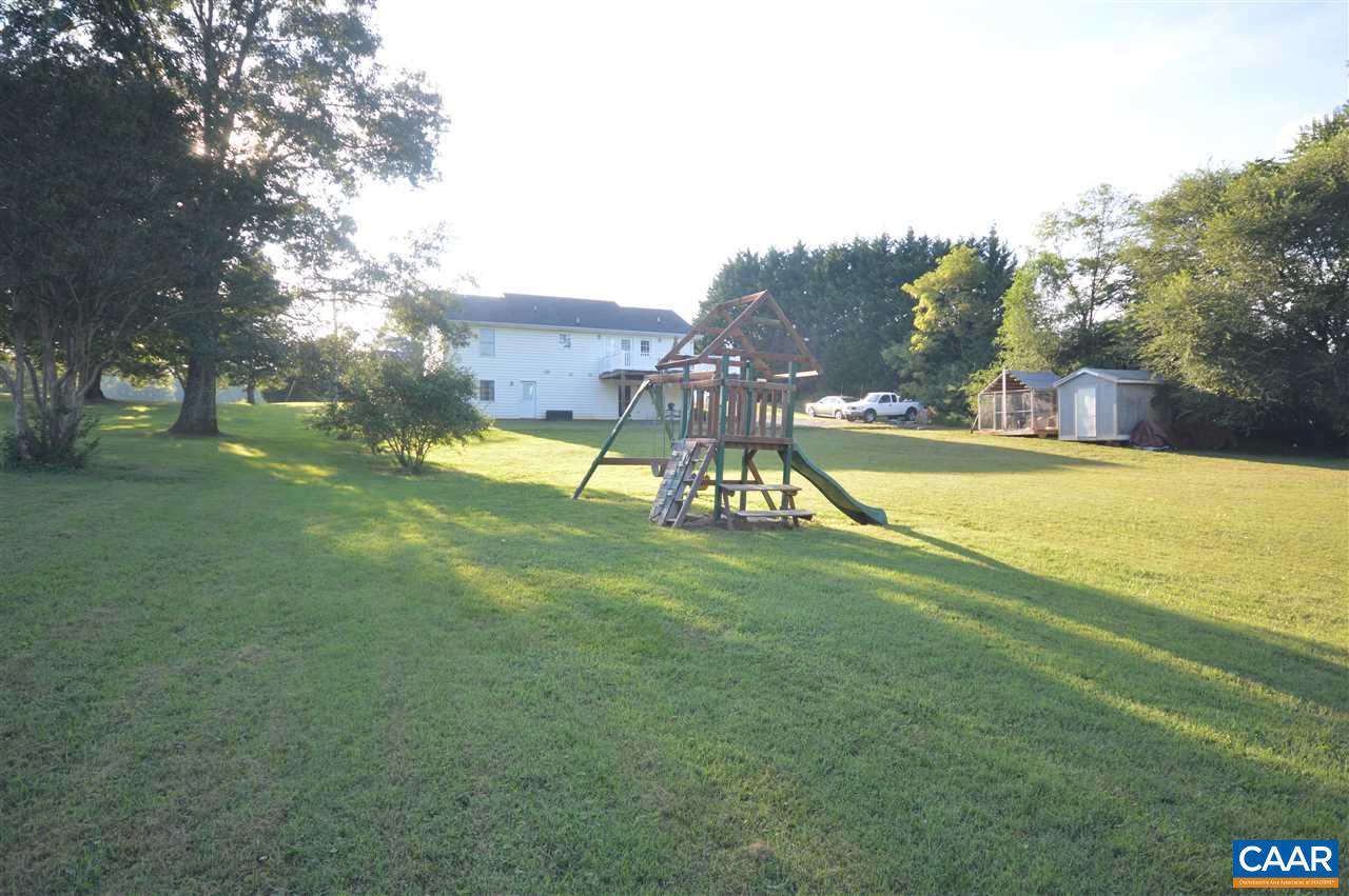 162 Stephens Loop Ruckersville, VA 22968 - Photo 24 of 29 a view of a swimming pool with a garden and plants