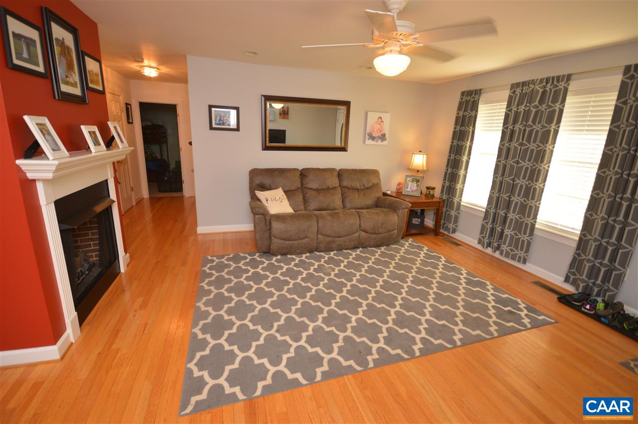 162 Stephens Loop Ruckersville, VA 22968 - Photo 5 of 29 a bedroom with a bed and wooden floor