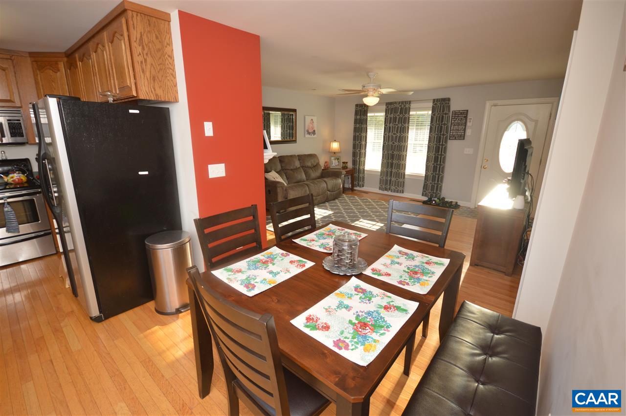 162 Stephens Loop Ruckersville, VA 22968 - Photo 7 of 29 a view of a living room with furniture and wooden floor