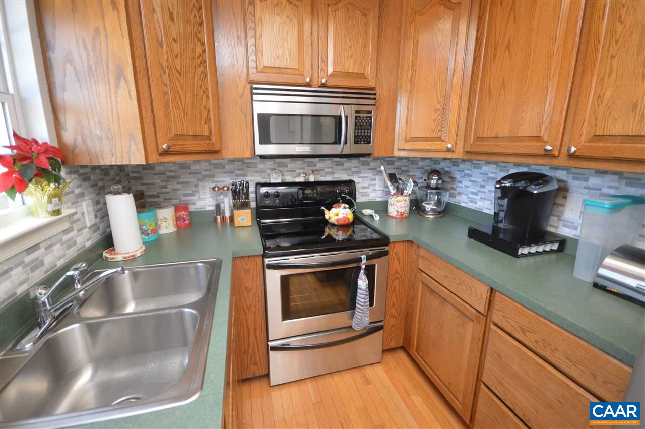 162 Stephens Loop Ruckersville, VA 22968 - Photo 8 of 29 a kitchen with a sink and cabinets
