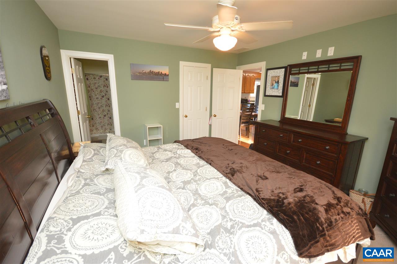 162 Stephens Loop Ruckersville, VA 22968 - Photo 10 of 29 a bedroom with a double vanity sink and a mirror