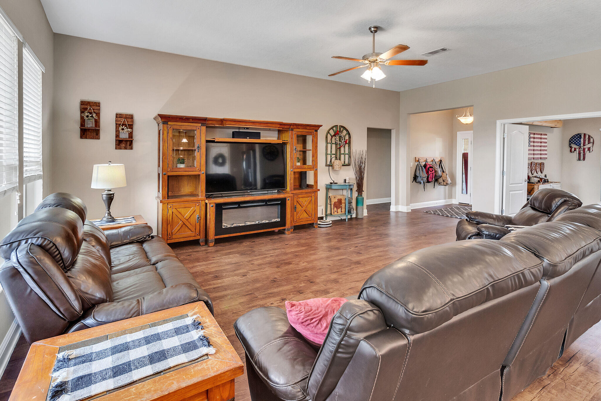 3044 Crown Creek Circle Crestview, FL 32539 - Photo 11 of 41 a living room with furniture and wooden floor