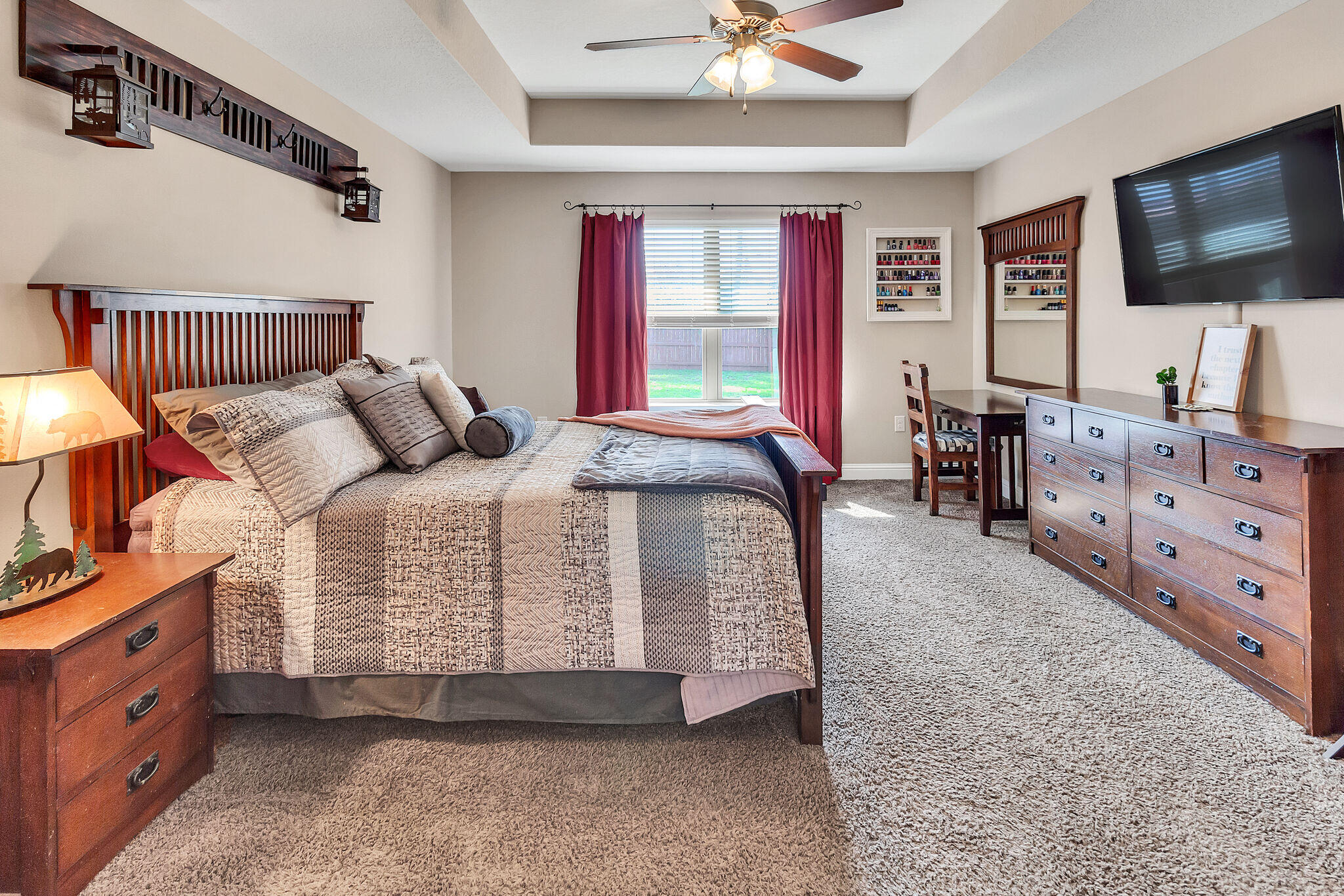 3044 Crown Creek Circle Crestview, FL 32539 - Photo 23 of 41 a bedroom with a bed and a flat screen tv