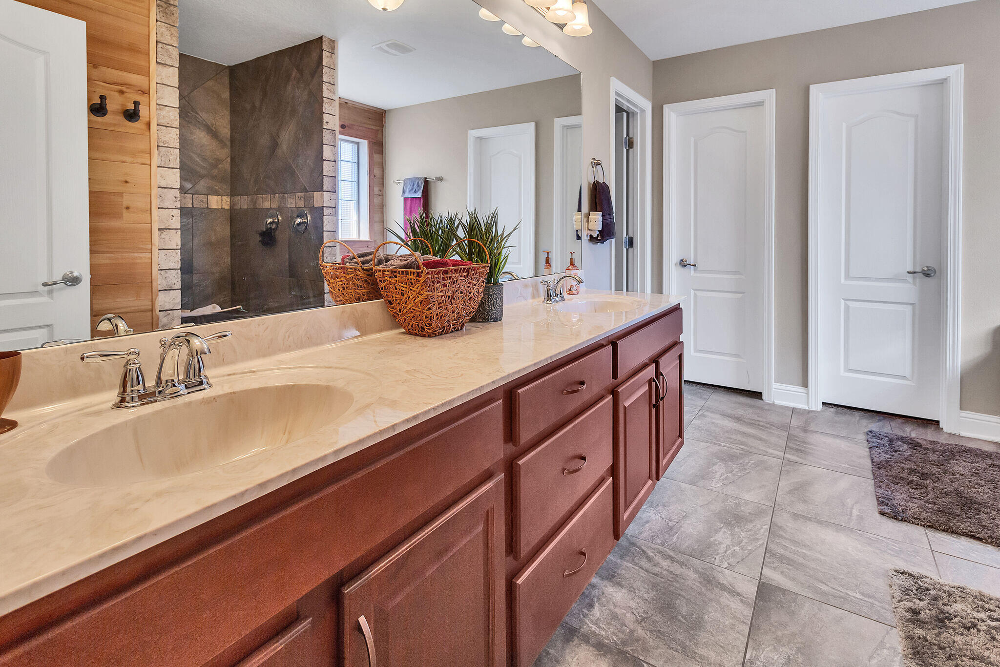 3044 Crown Creek Circle Crestview, FL 32539 - Photo 24 of 41 a bathroom with double vanity sink and a mirror