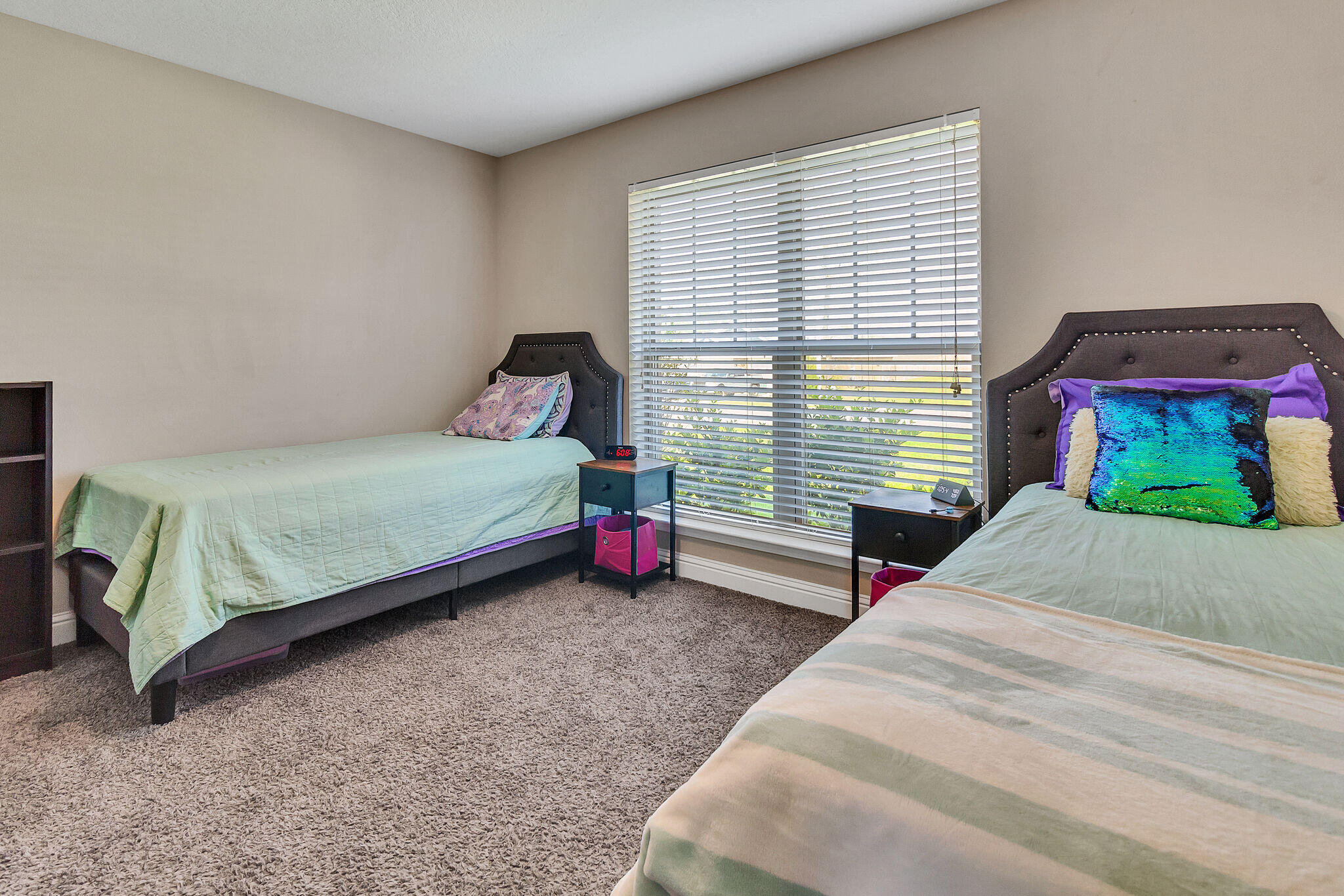 3044 Crown Creek Circle Crestview, FL 32539 - Photo 28 of 41 a bedroom with a bed a dresser and a window