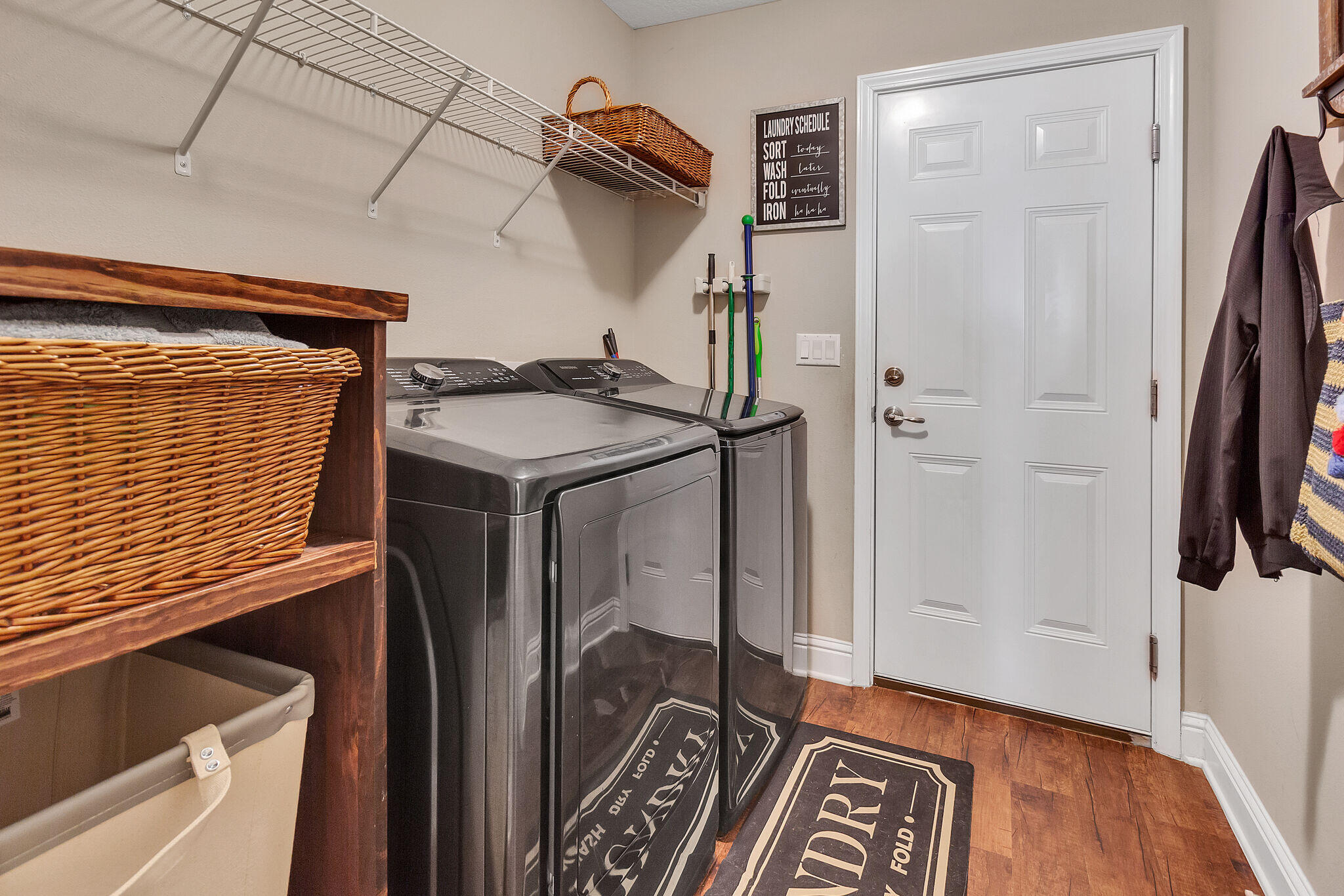 3044 Crown Creek Circle Crestview, FL 32539 - Photo 33 of 41 a view of walk in closet with clothes and shoes