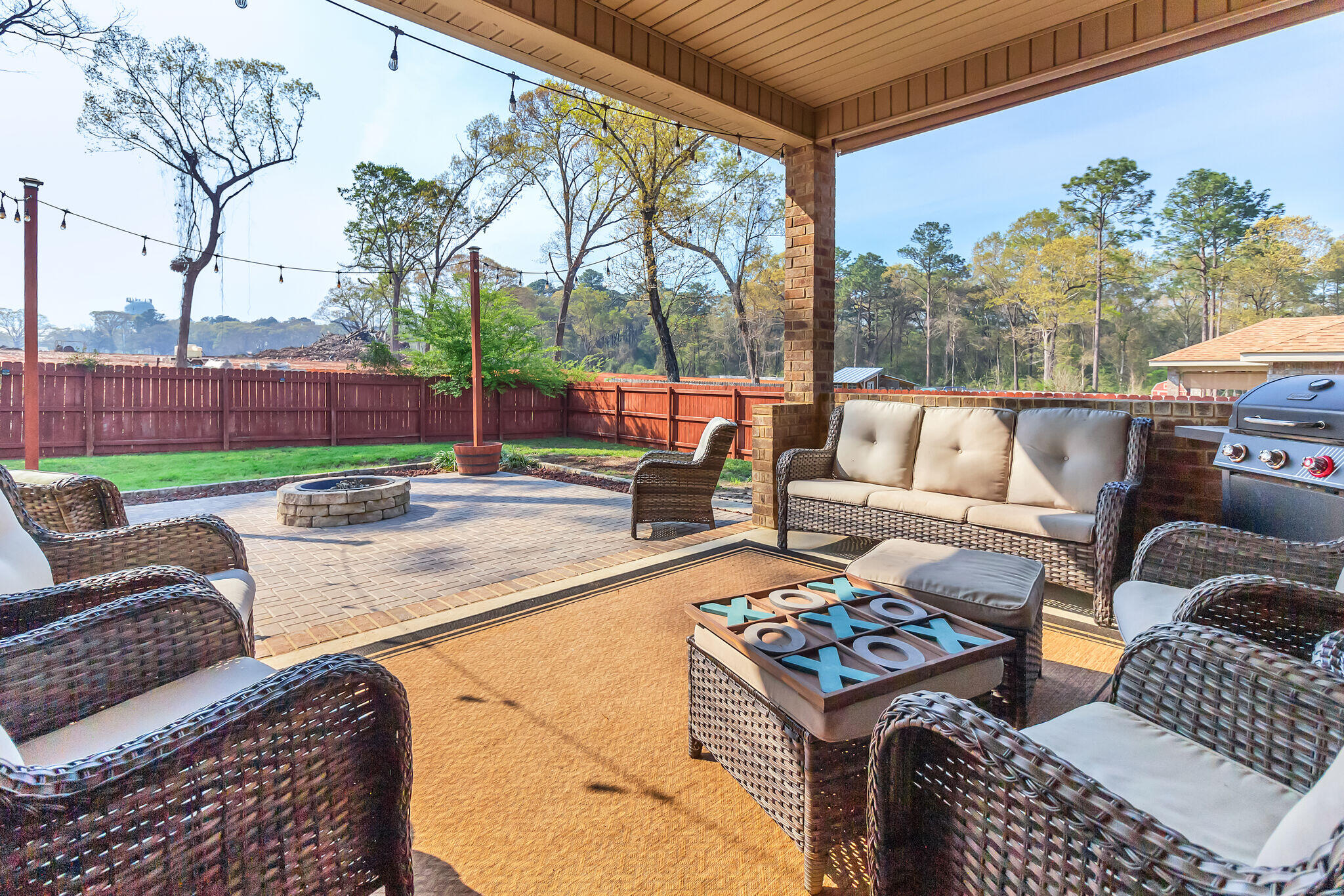3044 Crown Creek Circle Crestview, FL 32539 - Photo 34 of 41 a outdoor living space with patio furniture and a potted plant