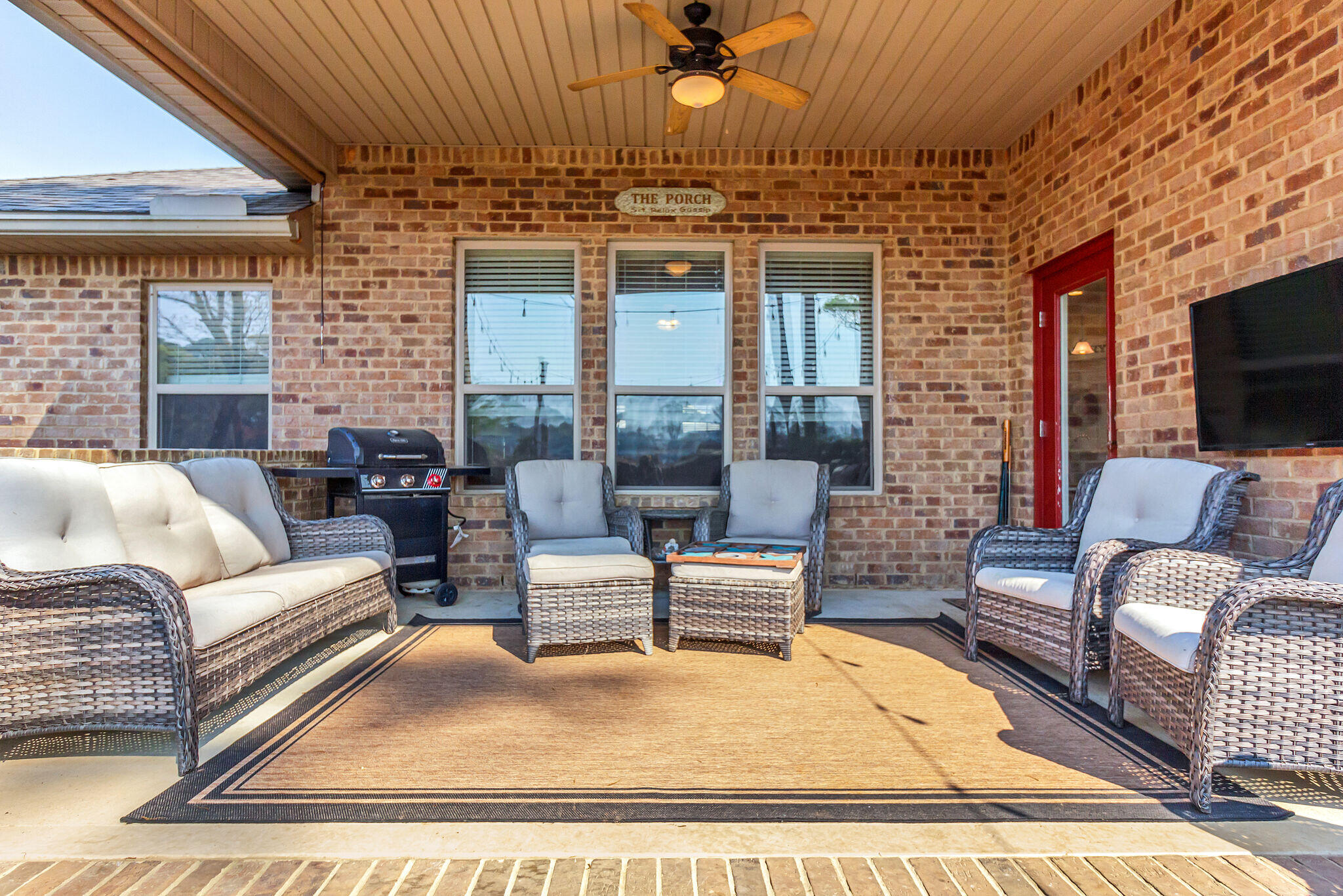 3044 Crown Creek Circle Crestview, FL 32539 - Photo 35 of 41 a living room with furniture and a flat screen tv
