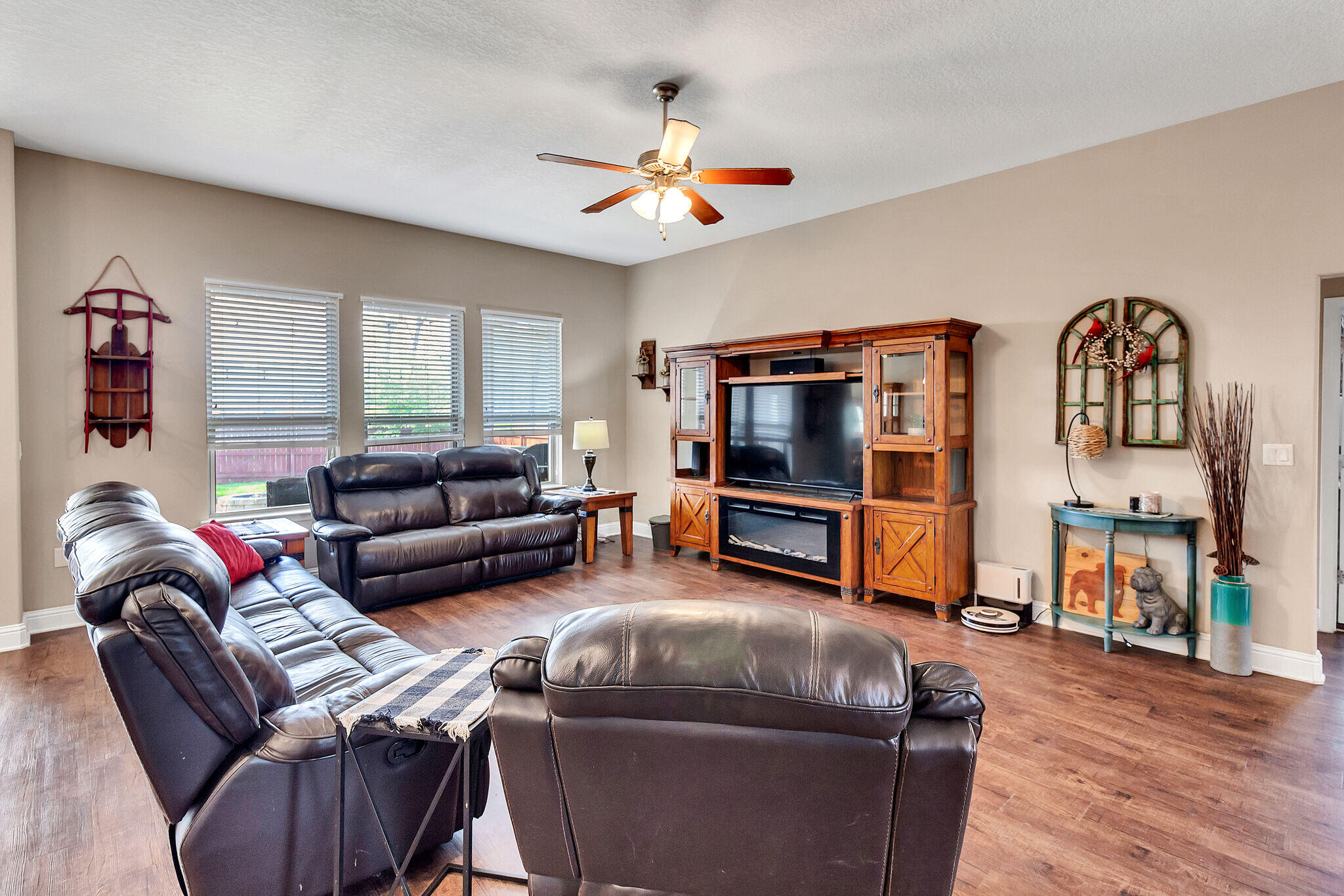 3044 Crown Creek Circle Crestview, FL 32539 - Photo 5 of 41 a living room with furniture and a flat screen tv