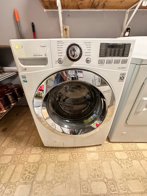 16-1562 Io Kea Rd Mountain View Mountain View, HI 96771 - Photo 24 of 30 a utility room with a washer and dryer