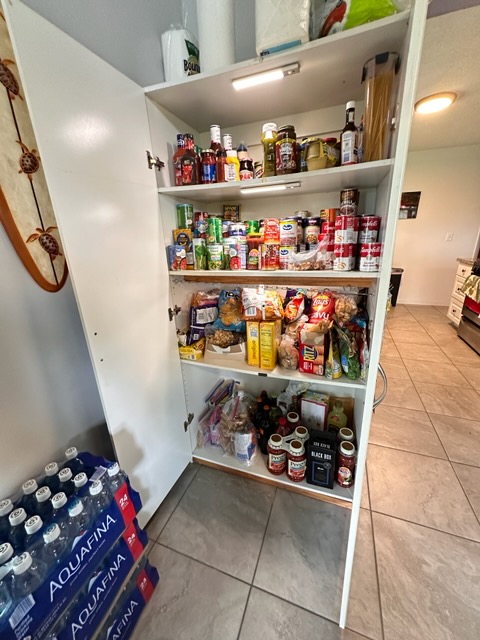 16-1562 Io Kea Rd Mountain View Mountain View, HI 96771 - Photo 29 of 30 a store room with lots of different kinds of food