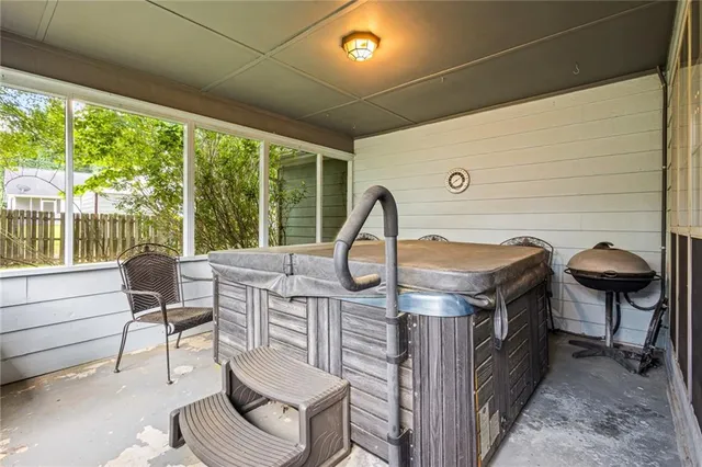 a view of living room kitchen with furniture and outdoor view