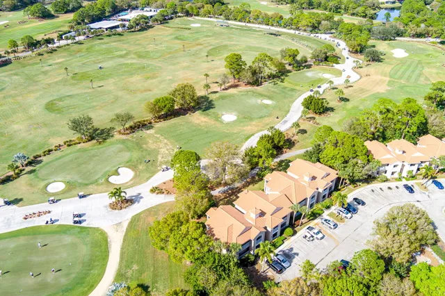 a view of a field with trees