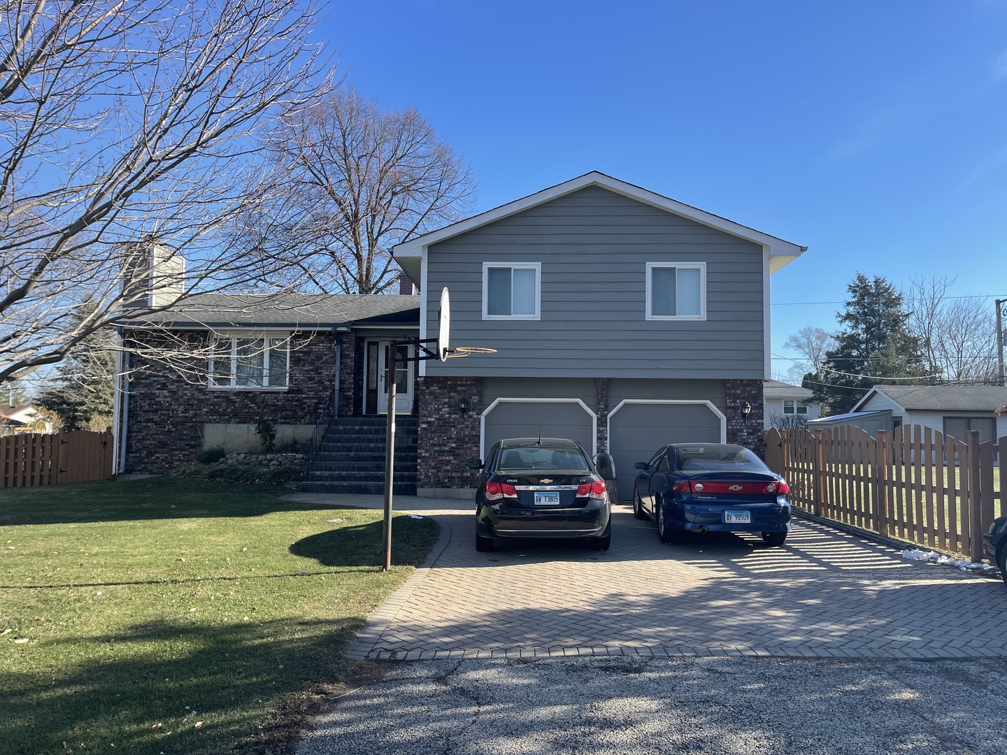 a car parked in front of a house