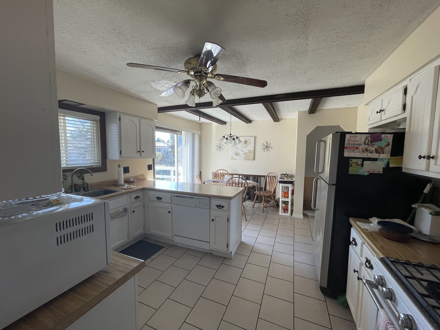 6602 Wander Way Cary, IL 60013 - Photo 11 of 45 a kitchen with a sink appliances and cabinets