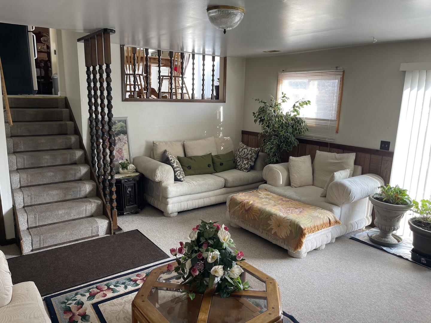 6602 Wander Way Cary, IL 60013 - Photo 30 of 45 a living room with furniture and a potted plant