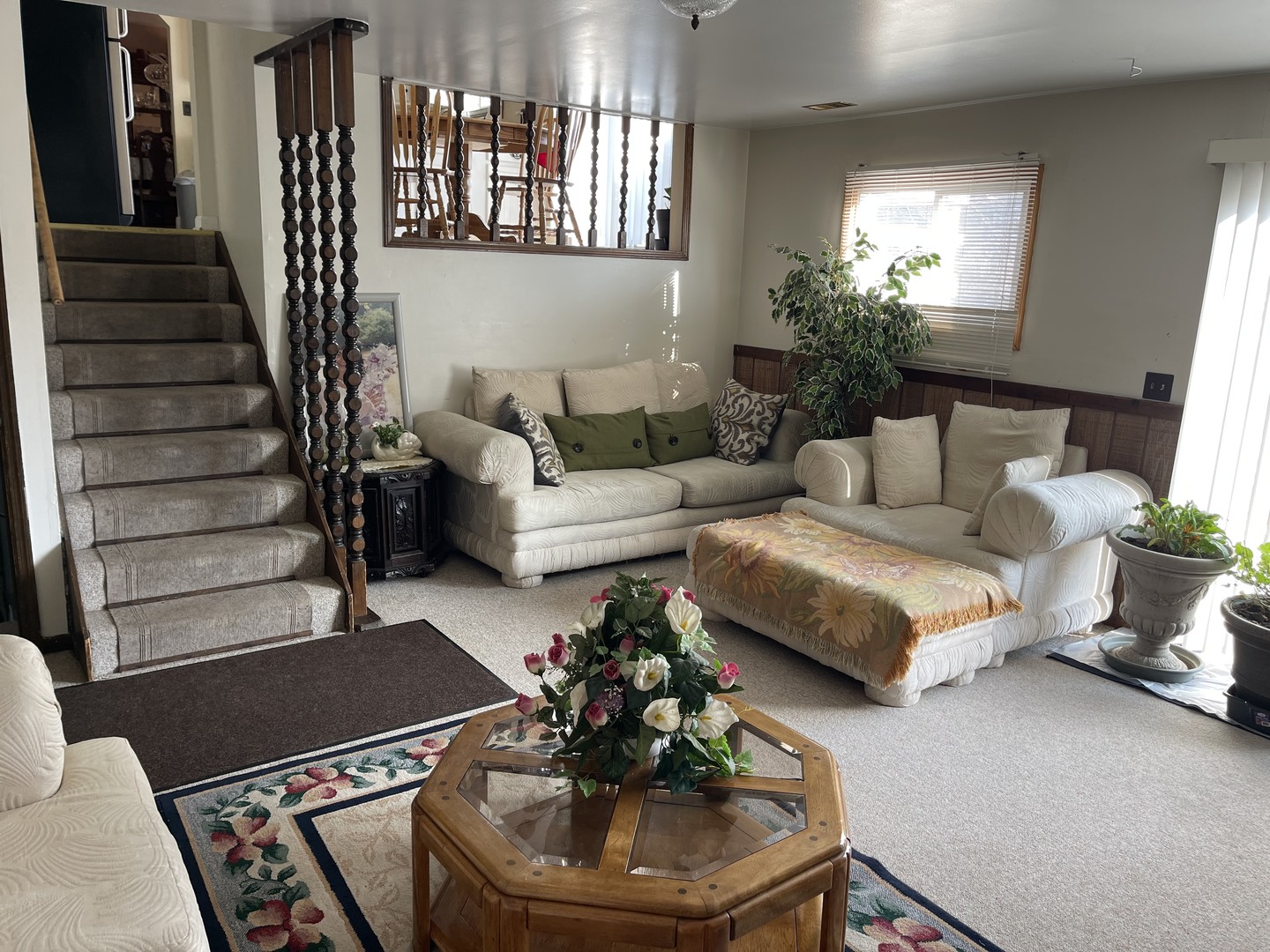 6602 Wander Way Cary, IL 60013 - Photo 31 of 45 a living room with furniture flowerpot and wooden floor