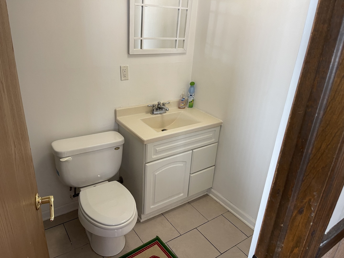 6602 Wander Way Cary, IL 60013 - Photo 34 of 45 a bathroom with a toilet sink and mirror