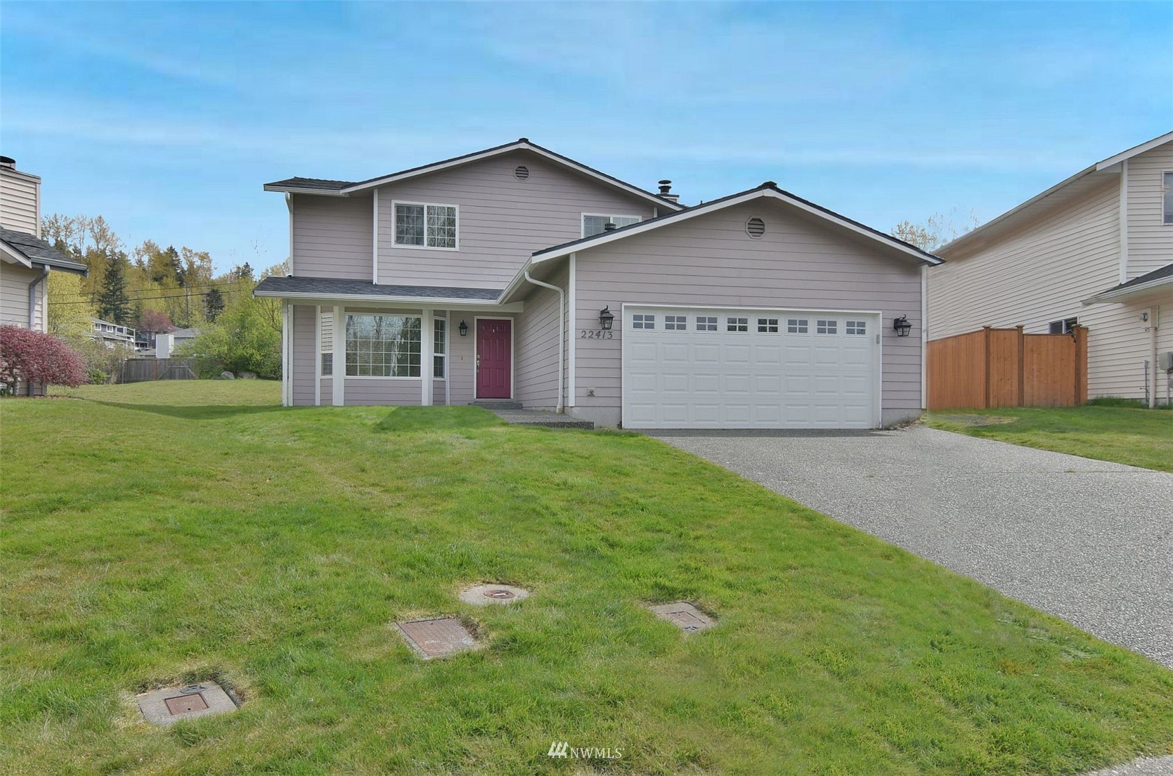 22413 14th Place West Bothell, WA 98021 - Photo 1 of 1 a view of a house with a yard and garage