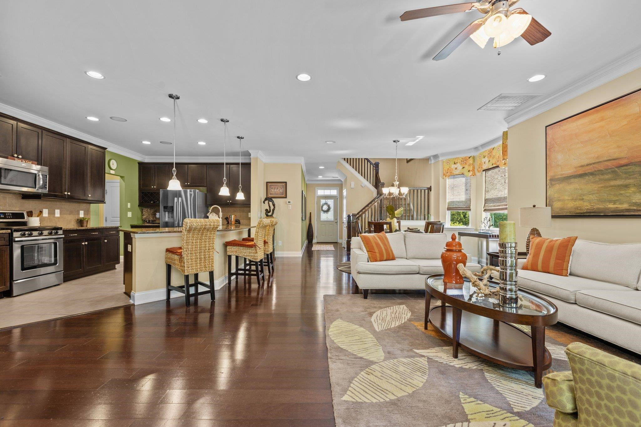 103 Daneborg Road Durham, NC 27703 - Photo 12 of 44 a living room with furniture kitchen view and a large window