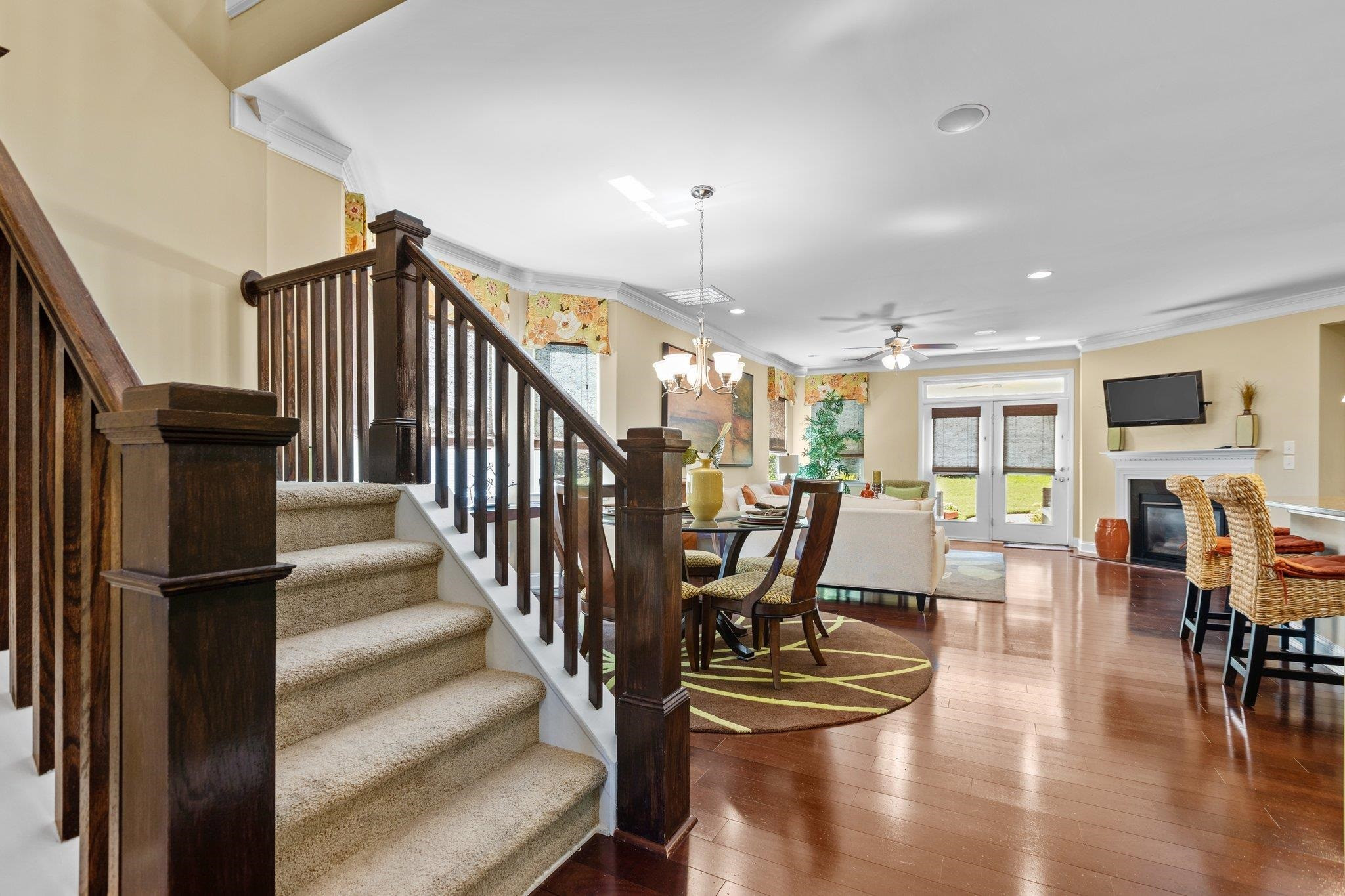 103 Daneborg Road Durham, NC 27703 - Photo 14 of 44 a dining room with furniture entryway and wooden floor