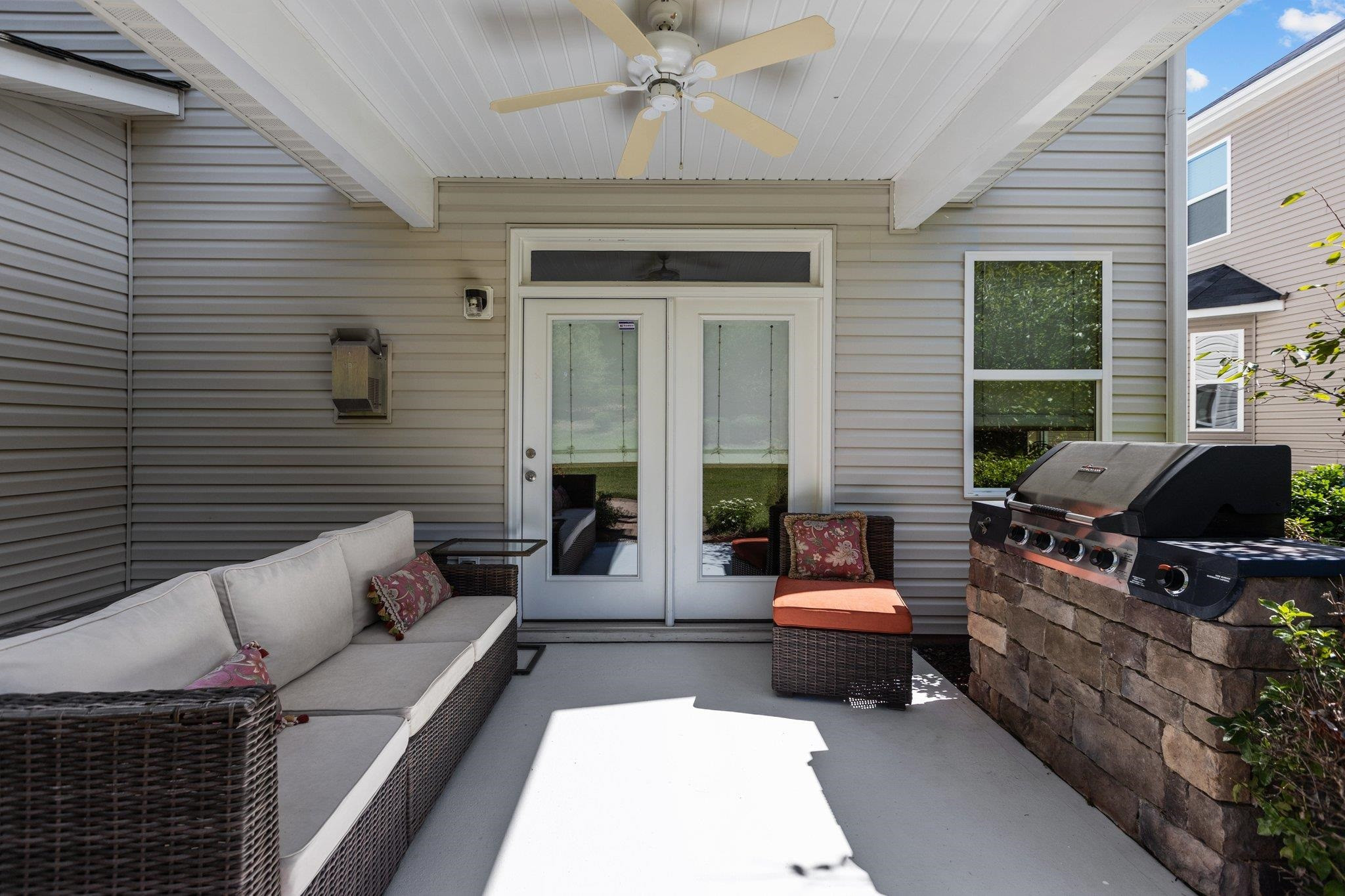 103 Daneborg Road Durham, NC 27703 - Photo 17 of 44 a view of a patio with couches table and chairs and potted plants