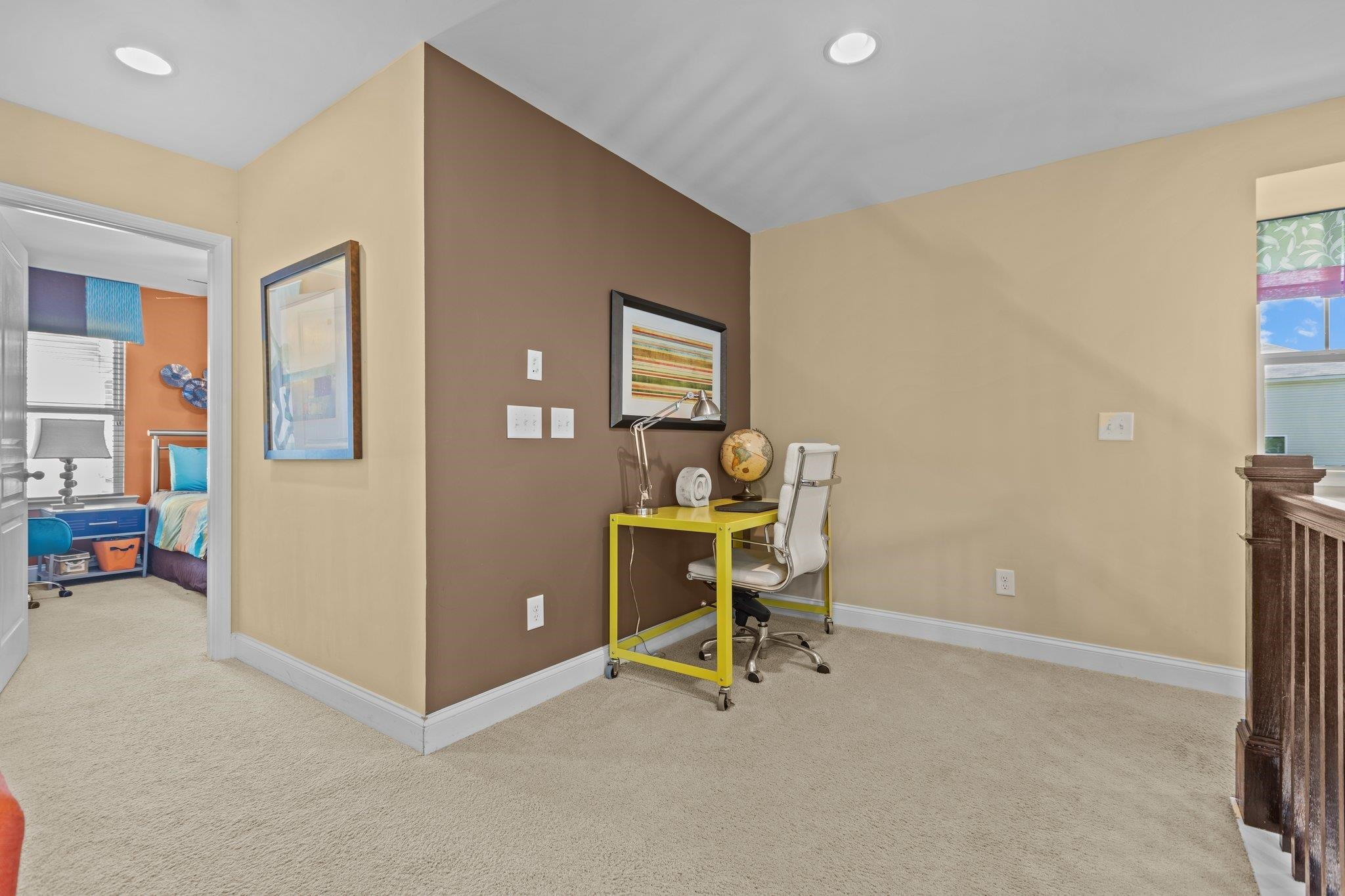 103 Daneborg Road Durham, NC 27703 - Photo 21 of 44 a view of a livingroom with furniture and a chair