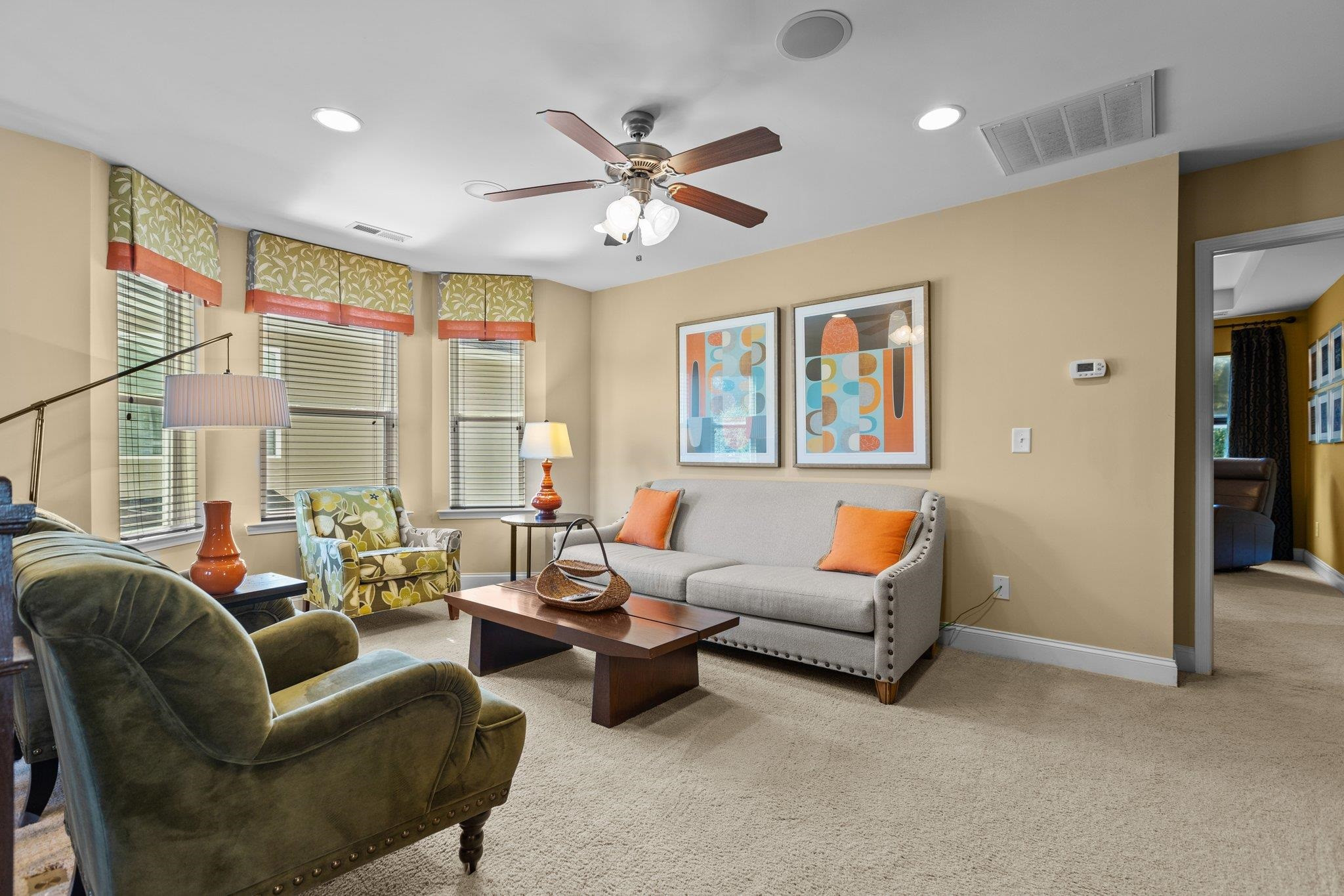 103 Daneborg Road Durham, NC 27703 - Photo 22 of 44 a living room with furniture ceiling fan and a window