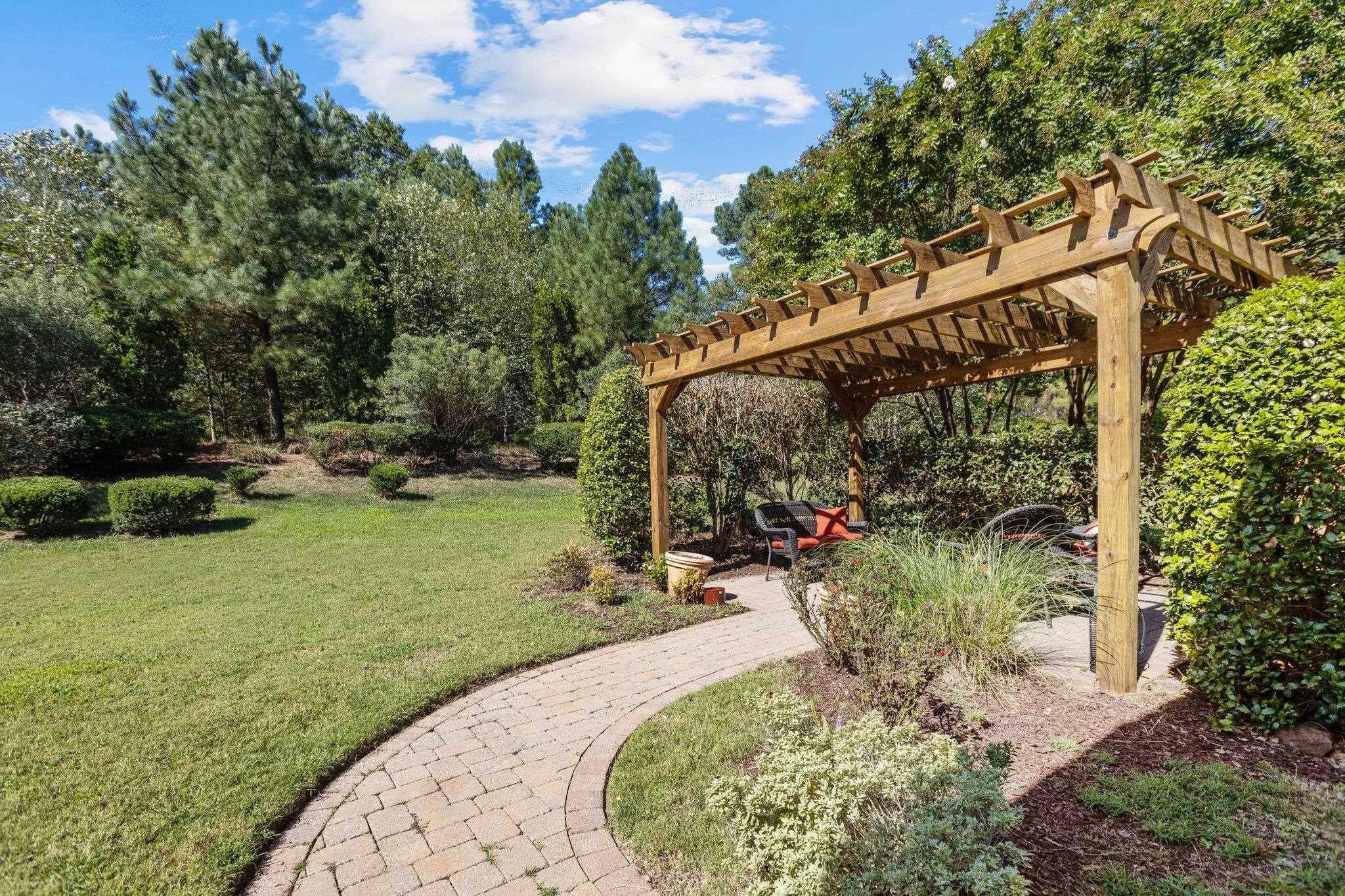 103 Daneborg Road Durham, NC 27703 - Photo 33 of 44 a view of a backyard