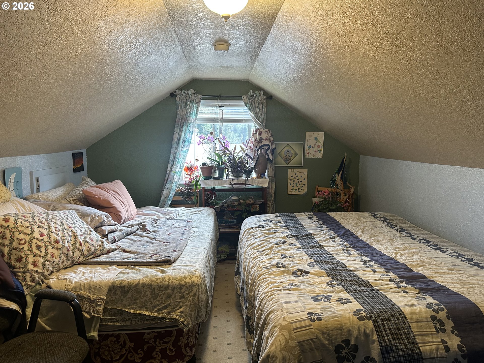 2063 Alder Avenue Reedsport, OR 97467 - Photo 14 of 29 a bedroom with bed and a window