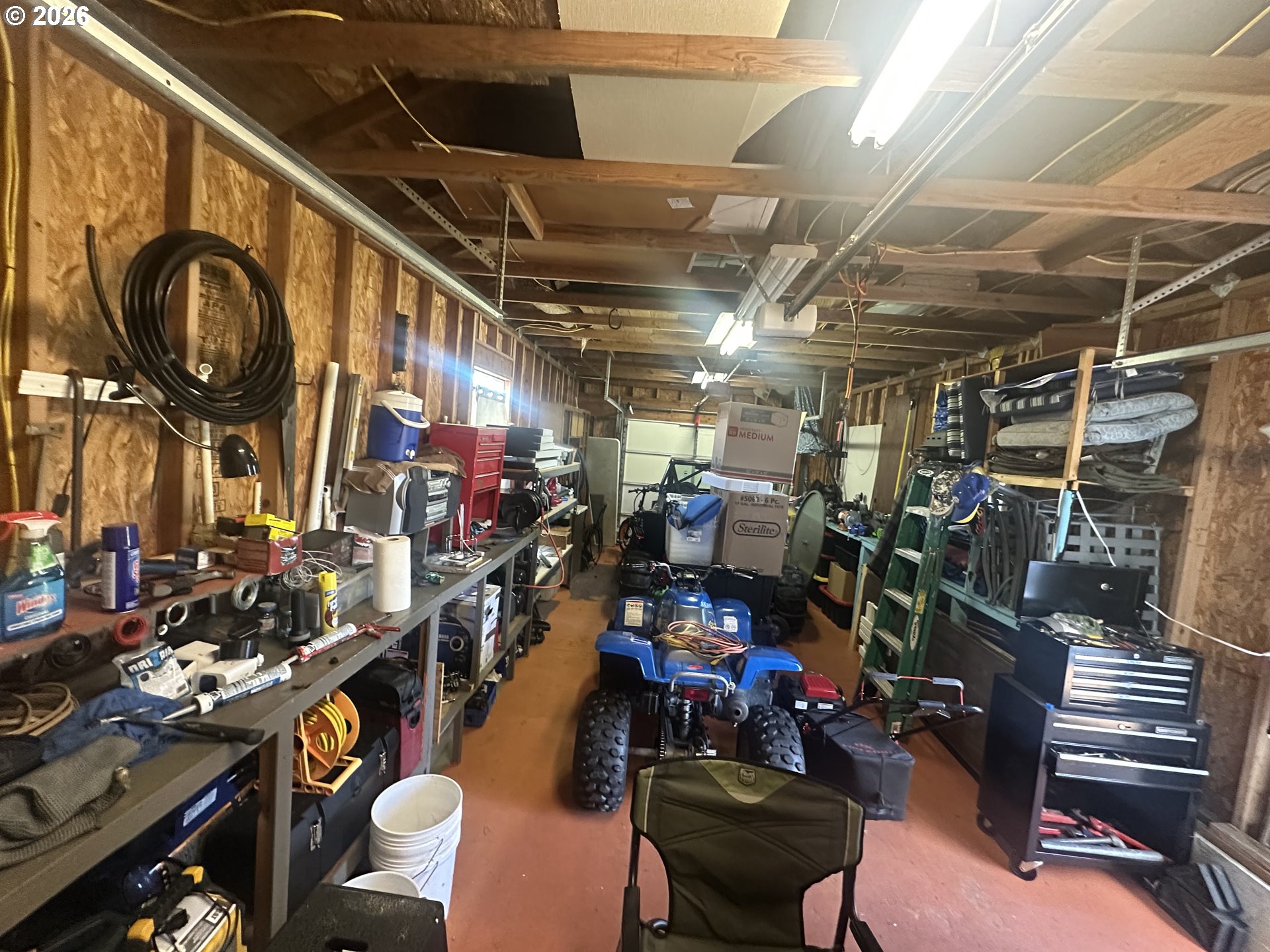 2063 Alder Avenue Reedsport, OR 97467 - Photo 20 of 29 a view of a storage room with a lot of stuff