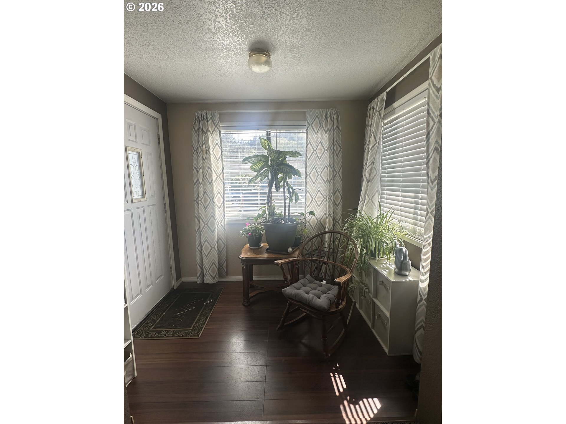2063 Alder Avenue Reedsport, OR 97467 - Photo 2 of 29 a living room with furniture and a large window