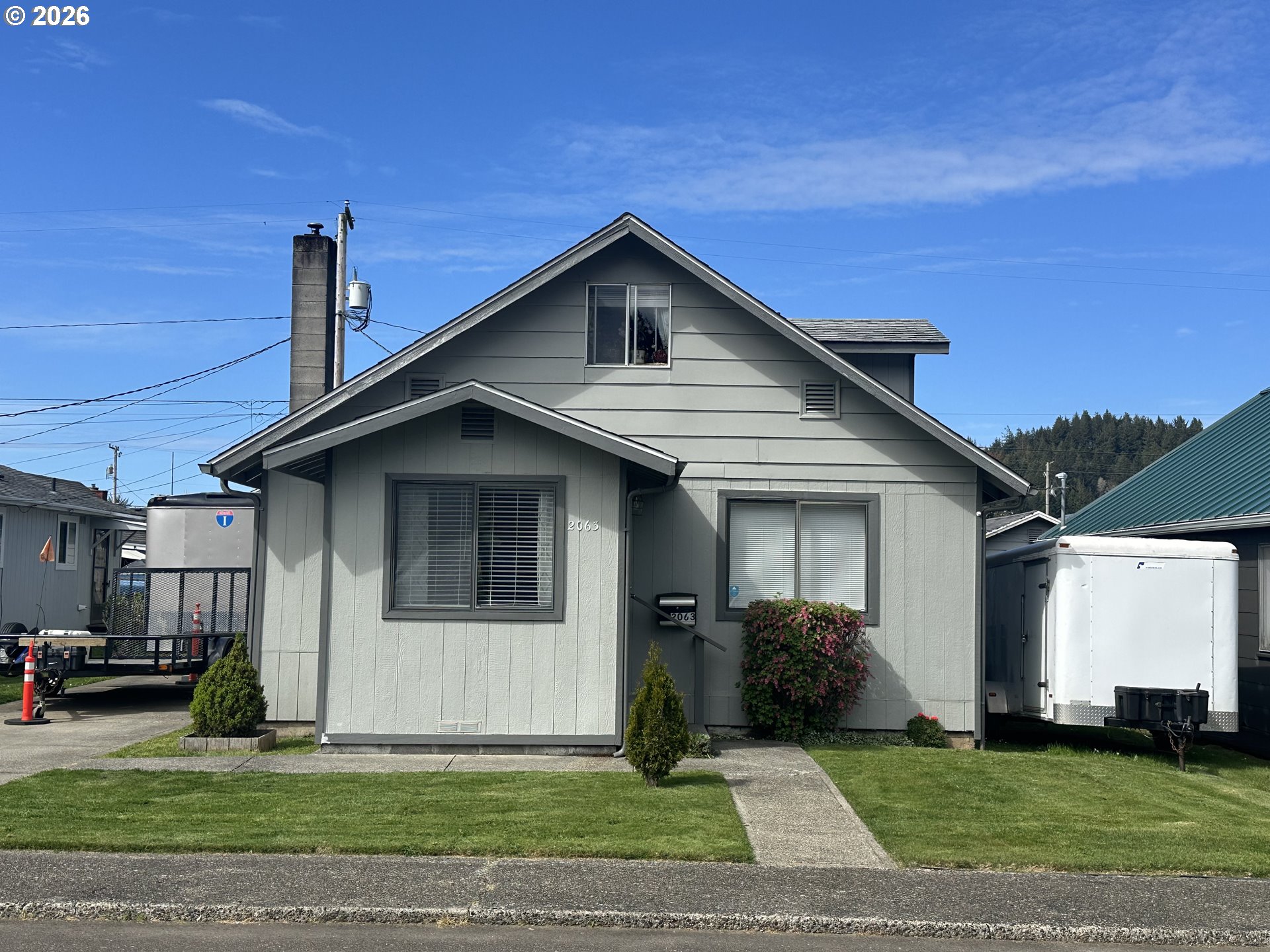 2063 Alder Avenue Reedsport, OR 97467 - Photo 29 of 29 a front view of a house with a yard