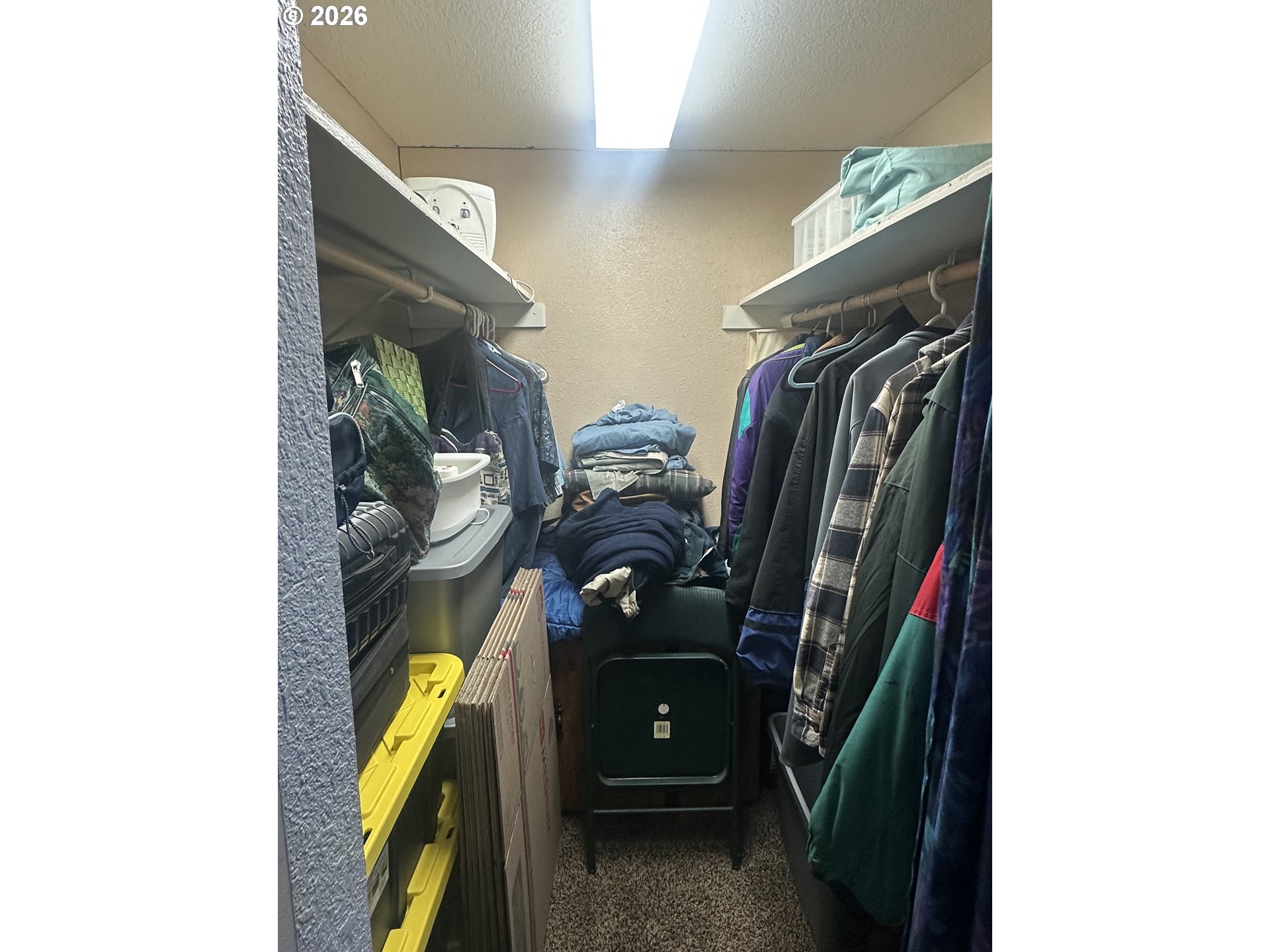 2063 Alder Avenue Reedsport, OR 97467 - Photo 7 of 29 a view of walk in closet with clothes and shoes