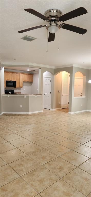 8180 Boat Hook Loop, Unit 310 Windermere, FL 34786 - Photo 3 of 11 a view of a kitchen with a sink and cabinets