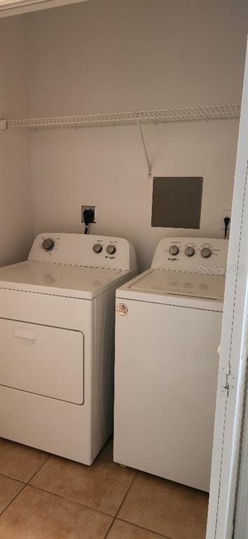 8180 Boat Hook Loop, Unit 310 Windermere, FL 34786 - Photo 8 of 11 a utility room with dryer and washer